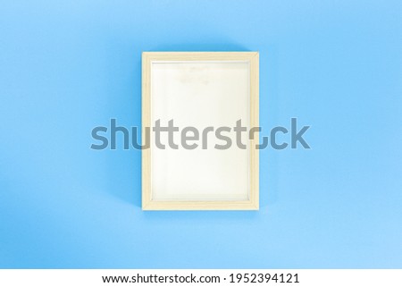 Photo Frame isolated on blue background 
