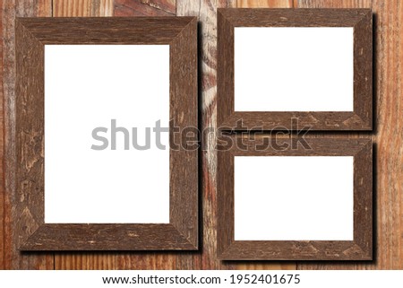 Square Blank wooden brown frame on wood plank wall