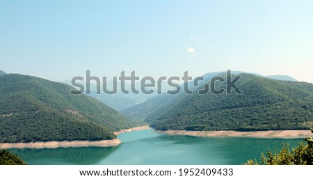 Lake Rica in Georgia, Tbilisi. Blue sky.
