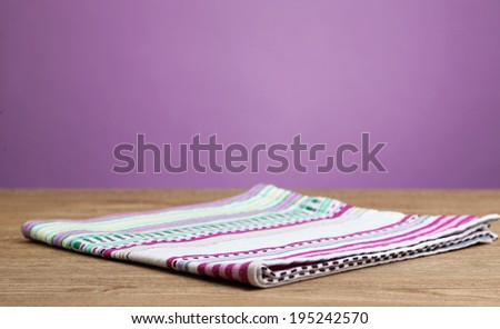 Background with wooden table and tablecloth