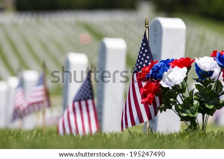 veterans cemetery memorial celebration with American Flag Royalty-Free Stock Photo #195247490