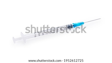 Syringes placed on a white background. Vaccination Concept Royalty-Free Stock Photo #1952612725