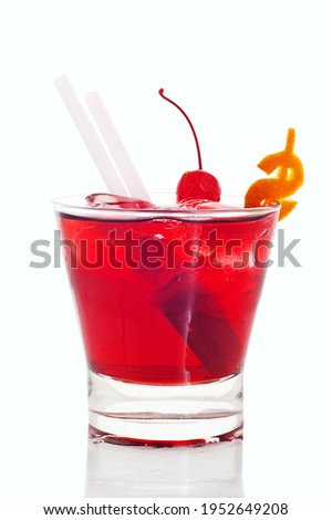 refreshing red cocktail with cherry dollar on white background