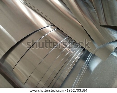 piles of industrial aluminum metal. small pieces of waste of left over production Royalty-Free Stock Photo #1952703184