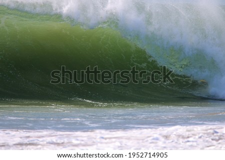 Waves breaking at Carcavelos beach, Portugal