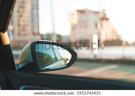view from car window.The view from the car in the city.Drive in the country.city as seen through a car window.city viewed from inside a car.travel concept. space for text.