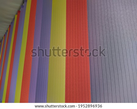 colored vertical curtains close up photo texture and background