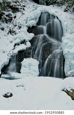Beautiful long exposure of waterfall frozen in Vermont