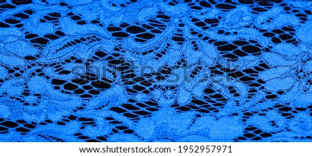 blue lace fabric, delicate embossed lace fabric, scalloped on both edges. Suitable for your projects, design, etc. Texture, background