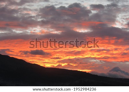 Sunset from the north of Ecuador's capital: Quito behind Pichincha's volcano