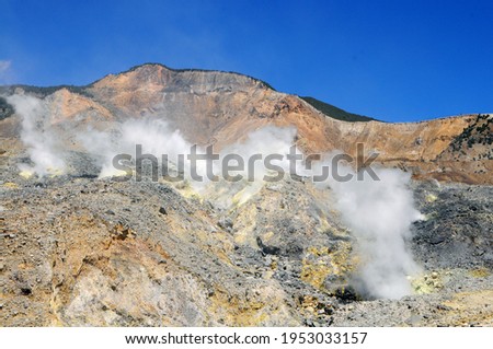 Sulfur smoke comes out of the crater of volcanic mountains which is still active. Mount Papandayan, West Java, Indonesia