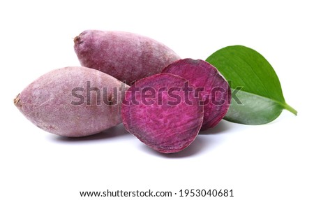 Raw purple sweet potato or yam isolated on white background stock photo
