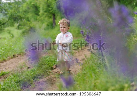 lonely girl standing on forest path