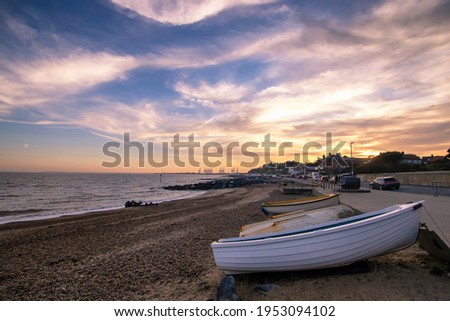Sunset over the seafront at Felixstowe in Suffolk, UK Royalty-Free Stock Photo #1953094102