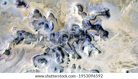 radioactive remains, abstract photography of the deserts of Africa from the air. aerial view of desert landscapes, Genre: Abstract Naturalism, from the abstract to the figurative, contemporary