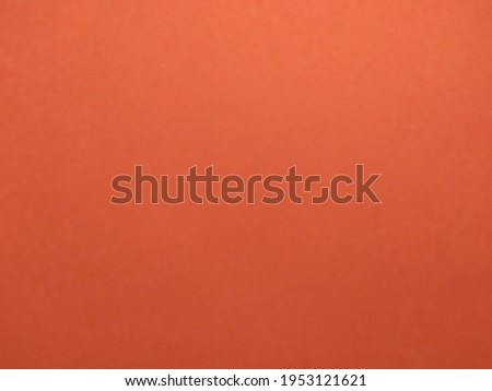 Orange paper color texture for background.
