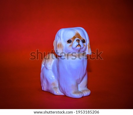 beautiful beige dog made of. porcelain