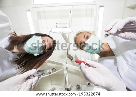 Dentist and nurse from low angle view
