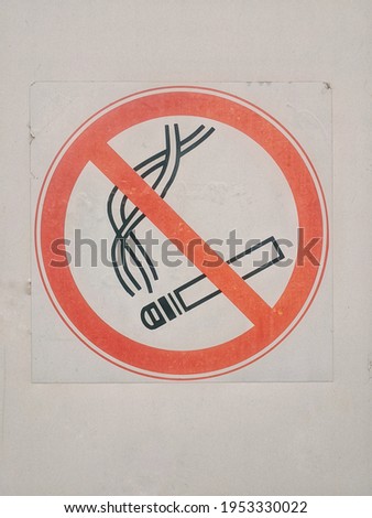 Don't smoke sign No smoking sign in white wall outdoor. 