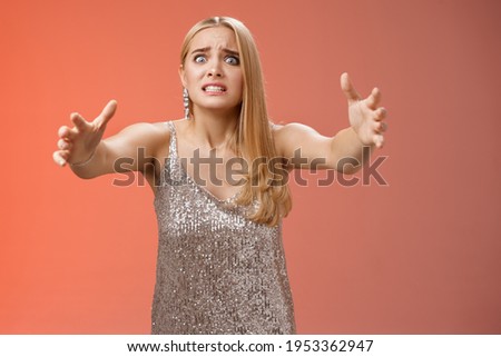 Obsessed ex-girlfriend widen eyes crazy clench teeth stretch hands forward wanna hold tight forever together standing crazy weird red background in silver dress clingy girl want hugs, cuddles
