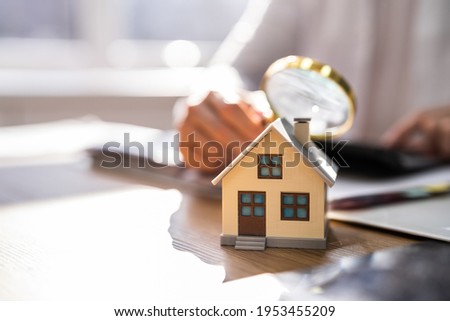 House Inspection With Magnifying Glass. Investigate Real Estate Rent