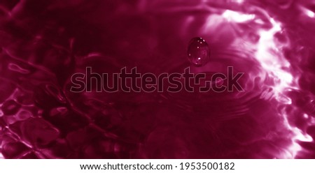 Purple water drops on the surface for background