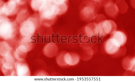 Blurred abstract bokeh with carmine red for background.