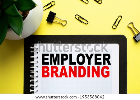 Notepad with inscriptions EMPLOYER BRANDING on a white background. business concept.