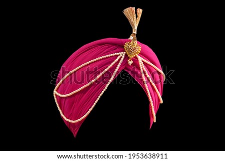 Rajasthani Punjabi wedding turban. Indian culture. selective focus Royalty-Free Stock Photo #1953638911