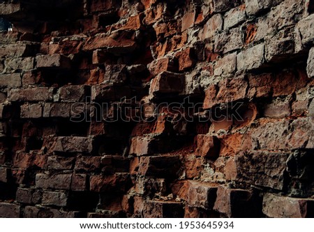 Brickwork of the old wall. Close-up.