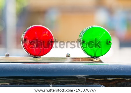 Red And Green Sirens On Car Top