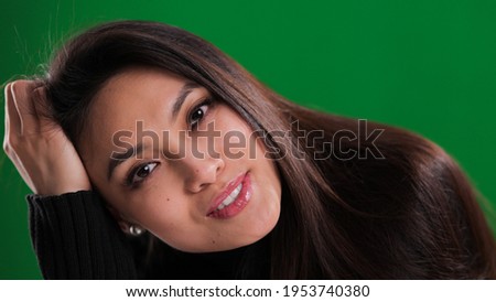 Girl with an exceptionally pretty face in close-up - studio photography