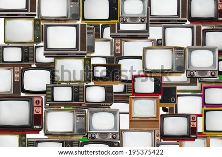 Many old televisions bundled together