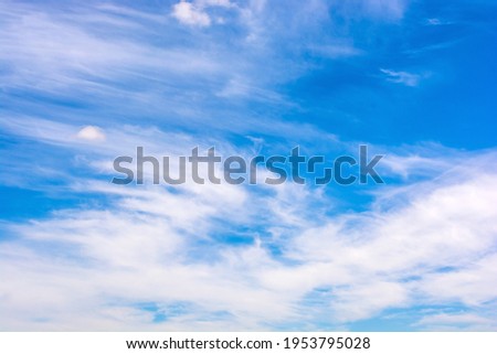 Photo of a beautiful blue sky with clouds at summer