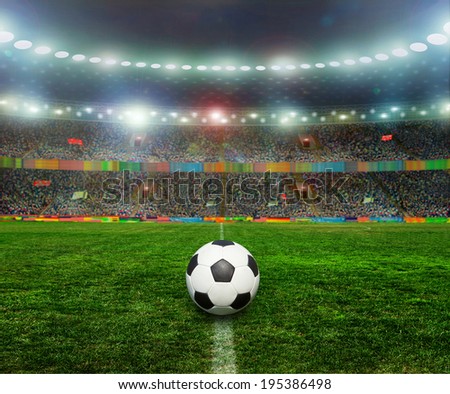 Soccer ball on the field of stadium with light  Royalty-Free Stock Photo #195386498