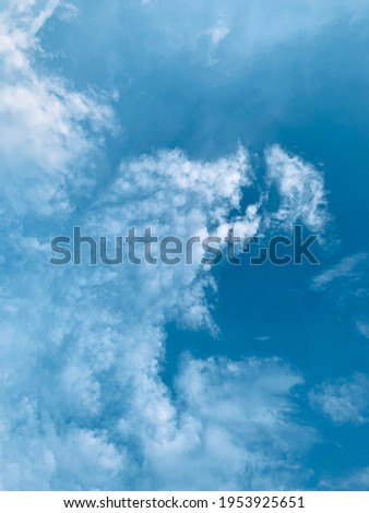 cirrus clouds in the sky today are imagined like big waves in the sea. Very beautiful in Bangkok, Thailand.no focus Royalty-Free Stock Photo #1953925651