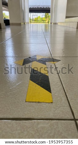 Straight Arrow line on the floor