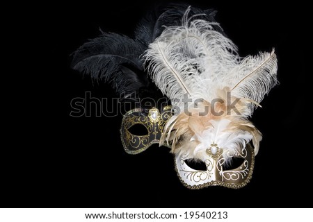 Venetian masks on black background