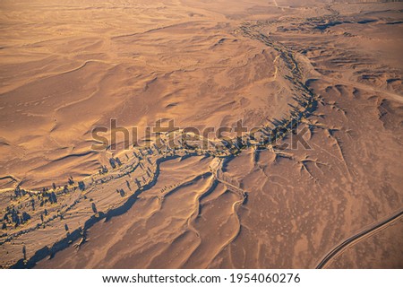 Amazing nature texture, aerial view of the red desert in Namibia, Africa.