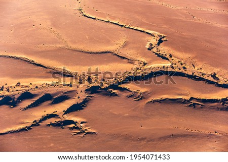 The desert of Namibia, aerial view. Natural scenery for travel to Africa.