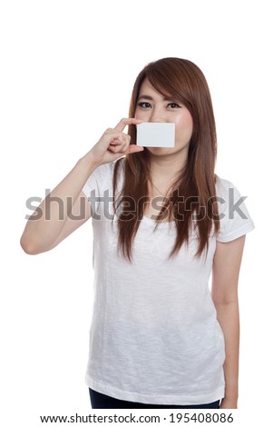 Asian girl close her mouth with a blank card isolated on white background