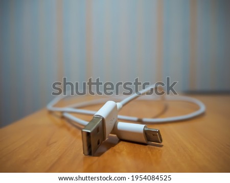 usb charger left on the table