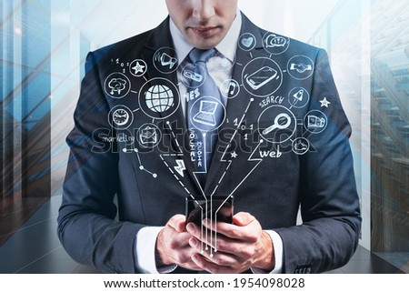 Office man with smartphone in hands, network digital bright icons drawing. Double exposure of social media symbols, worldwide connection and web communication. Concept of technology