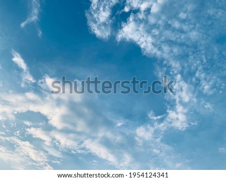 cirrus clouds in the sky today are imagined like big waves in the sea. Very beautiful in Bangkok, Thailand.no focus Royalty-Free Stock Photo #1954124341