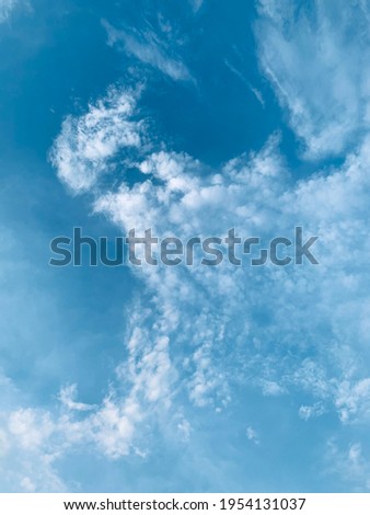 cirrus clouds in the sky today are imagined like big waves in the sea. Very beautiful in Bangkok, Thailand.no focus Royalty-Free Stock Photo #1954131037