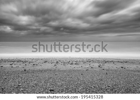 Long exposure of a rocky beach in Kent area in UK (black and white) Royalty-Free Stock Photo #195415328