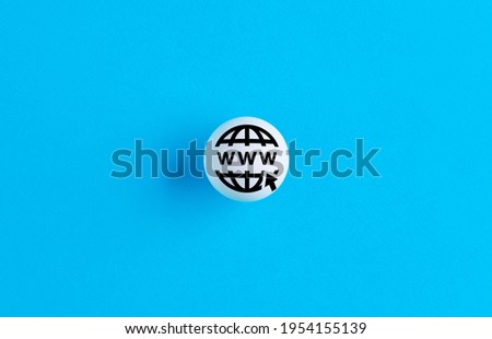 World wide web www symbol on a ball button on blue background. Internet technology concept. Royalty-Free Stock Photo #1954155139
