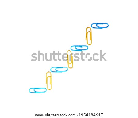 blurred Business concept growth process. Economy and finance development theme. from paper clip
