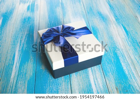 gift on wooden background .
