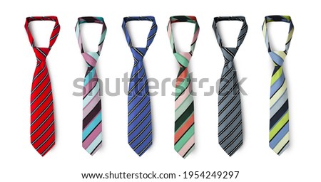 Strapped neckties in different colors, men's striped ties. Isolated on white background Royalty-Free Stock Photo #1954249297